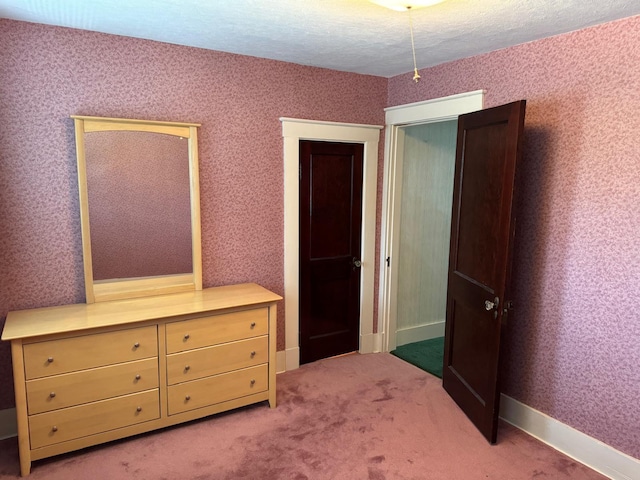 37 Fisher St, Fort Fairfield, ME 04742 - bedroom featuring a textured ceiling, baseboards, and carpet