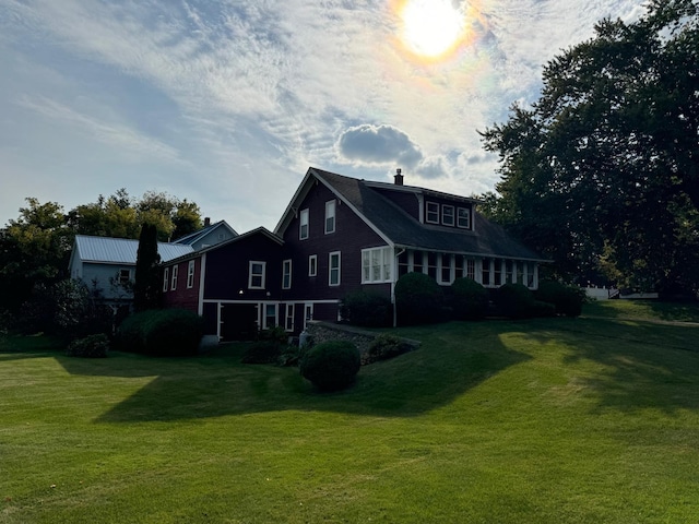37 Fisher St, Fort Fairfield, ME 04742 - view of home's exterior featuring a yard and a chimney