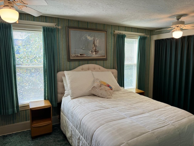 37 Fisher St, Fort Fairfield, ME 04742 - carpeted bedroom featuring wallpapered walls, a textured ceiling, and a ceiling fan