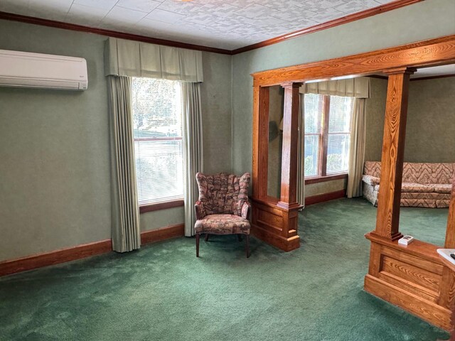 living area featuring ornamental molding, carpet flooring, a healthy amount of sunlight, and an AC wall unit