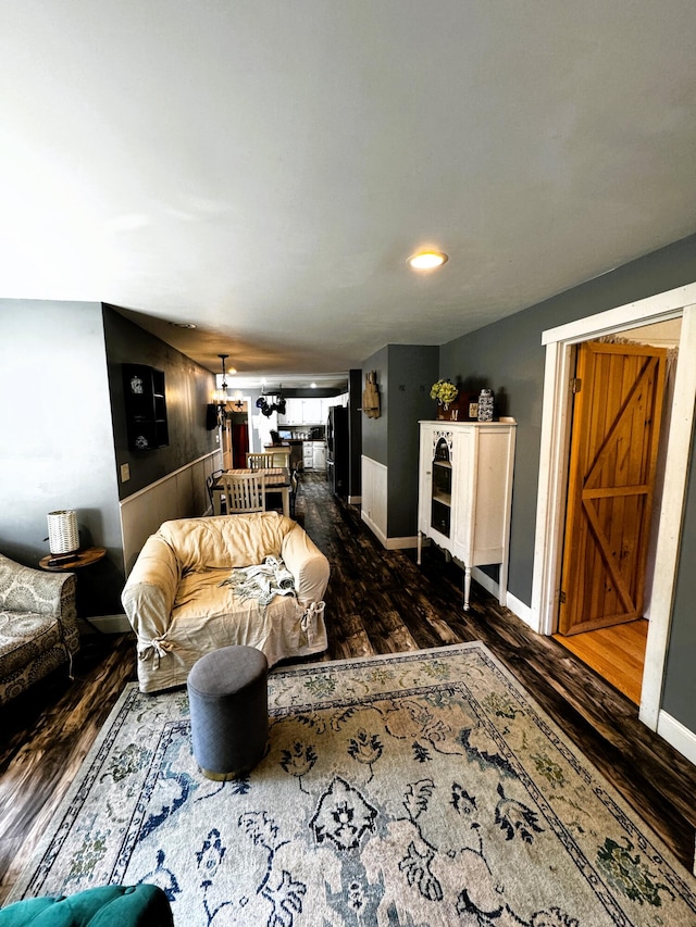 living room featuring dark hardwood / wood-style flooring