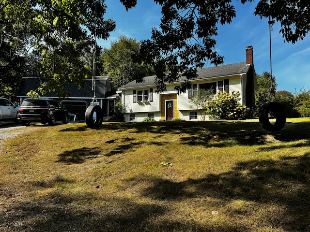 bi-level home featuring a front yard