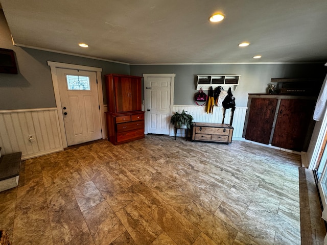 interior space featuring ornamental molding and a wall mounted AC