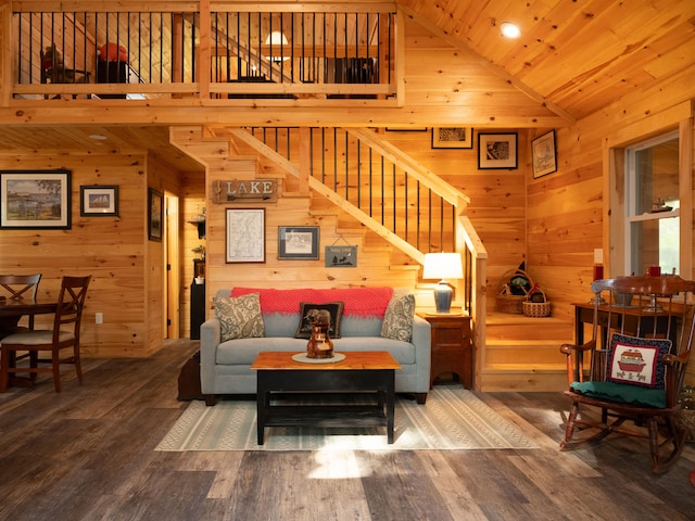 living room with high vaulted ceiling, wood walls, wood ceiling, and wood-type flooring