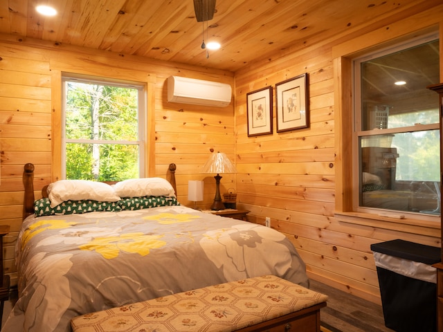 bedroom with wood walls, wood-type flooring, a wall mounted AC, and wood ceiling