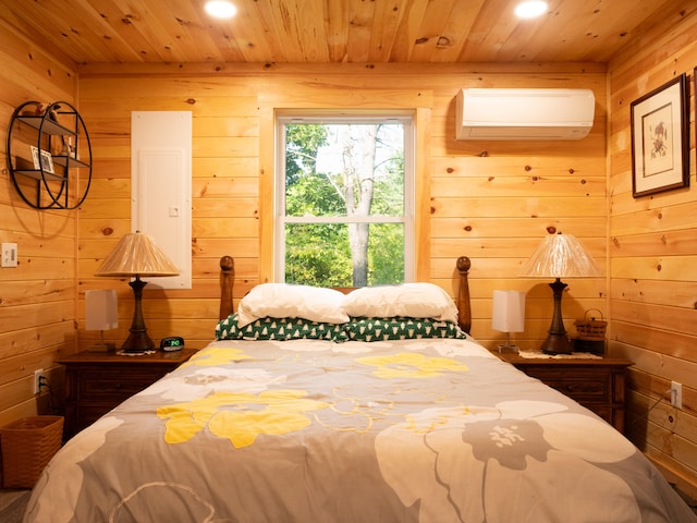 bedroom with wood walls, wooden ceiling, and a wall mounted AC