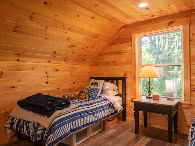 bedroom with wood walls, wood-type flooring, wooden ceiling, and lofted ceiling