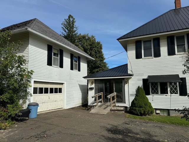 exterior space with a garage