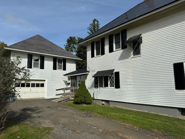 view of property exterior featuring a garage