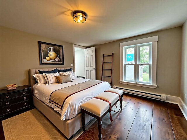 112 S St, Calais, ME 04619 - bedroom featuring a baseboard heating unit and hardwood / wood-style floors