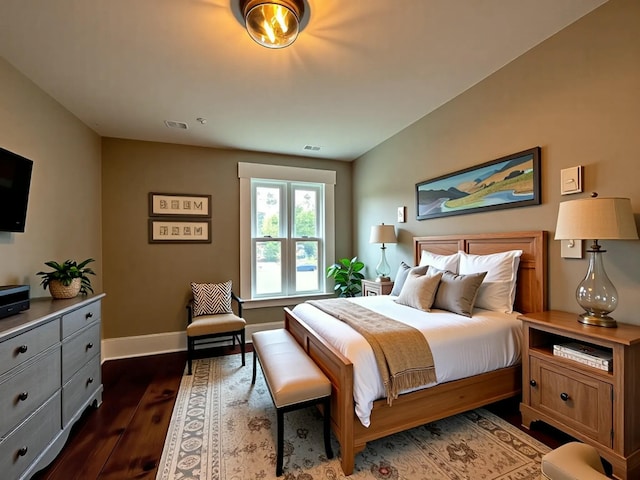 112 S St, Calais, ME 04619 - bedroom featuring dark wood finished floors and baseboards