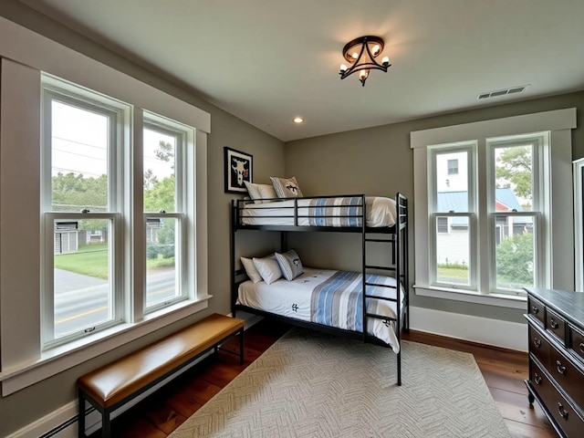 112 S St, Calais, ME 04619 - bedroom featuring dark wood-type flooring, baseboards, and recessed lighting