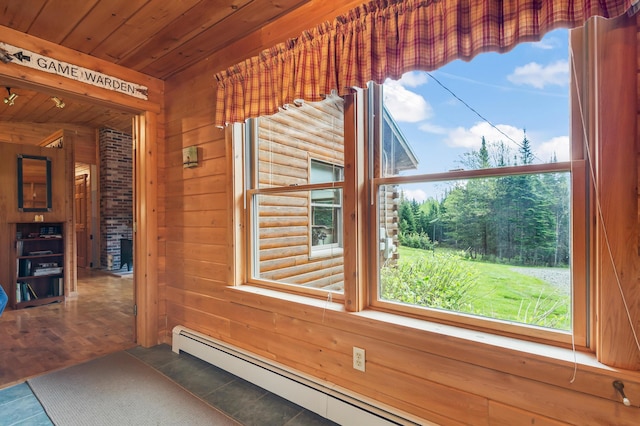 62 Antler Way, Rangeley, ME 04970 - detailed view of baseboard heating, wooden ceiling, and wood walls