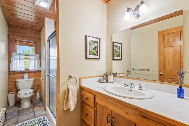 62 Antler Way, Rangeley, ME 04970 - bathroom with toilet, vanity, baseboard heating, a stall shower, and wood ceiling