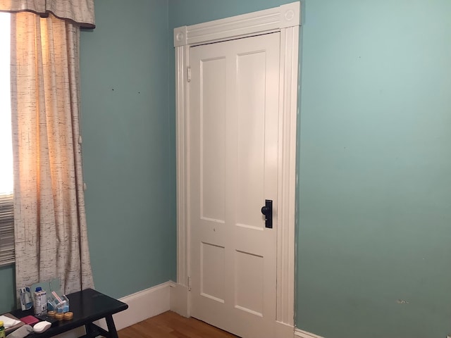 unfurnished bedroom featuring wood-type flooring