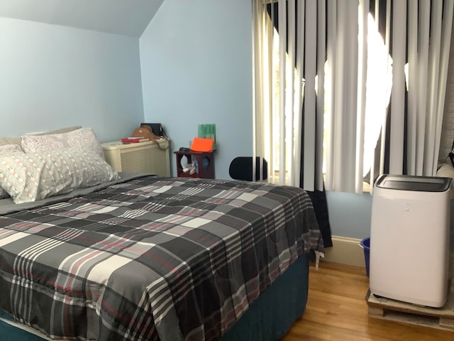 bedroom featuring light hardwood / wood-style floors