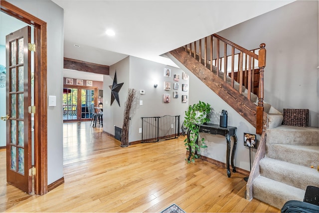 entrance foyer featuring wood-type flooring