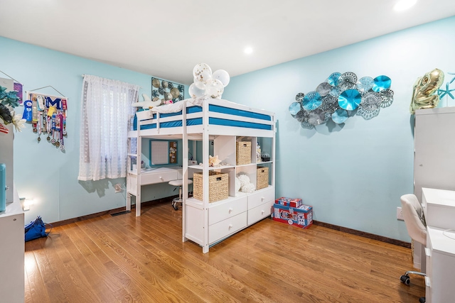 bedroom featuring light hardwood / wood-style floors