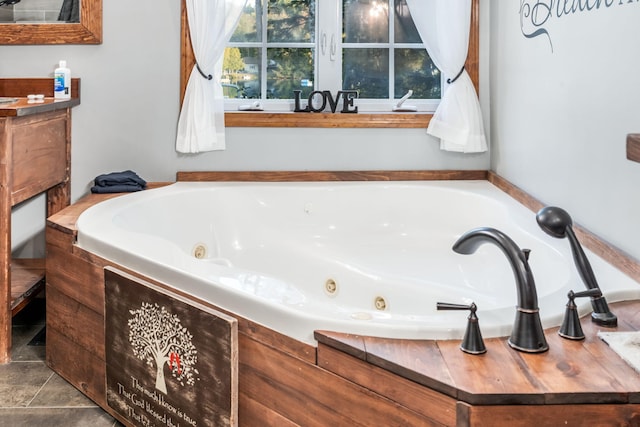 bathroom featuring a tub to relax in