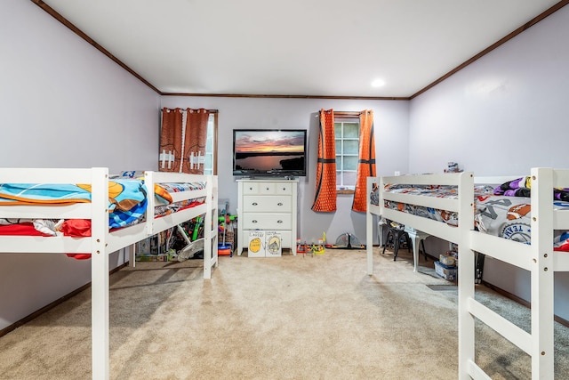 bedroom featuring carpet floors and crown molding