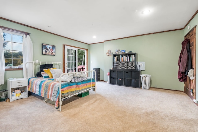 bedroom with carpet floors and ornamental molding