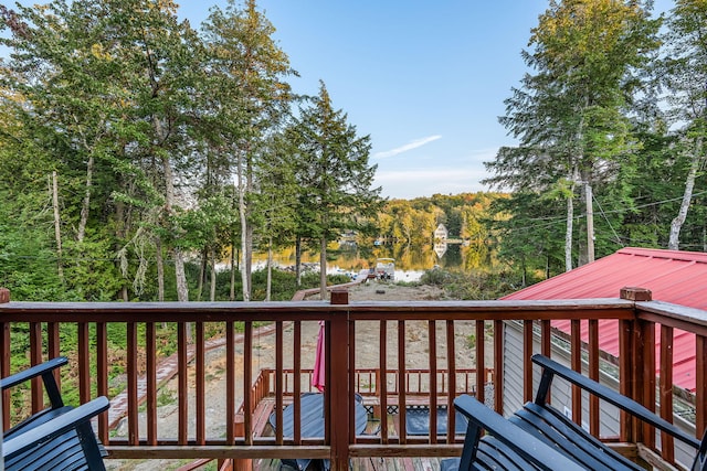 wooden terrace with a water view