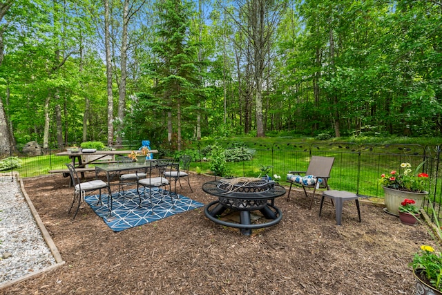 exterior space with an outdoor fire pit