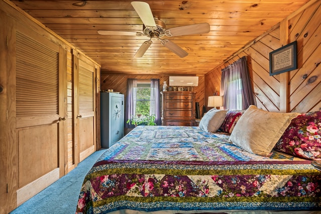 carpeted bedroom featuring wood ceiling, wood walls, and ceiling fan