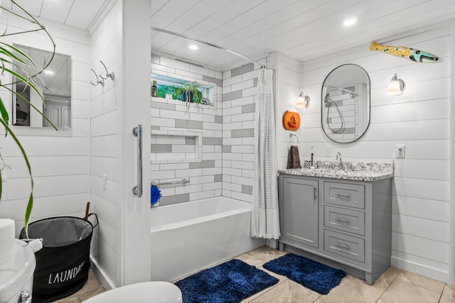 full bathroom featuring shower / bathtub combination with curtain, tile patterned floors, vanity, and toilet