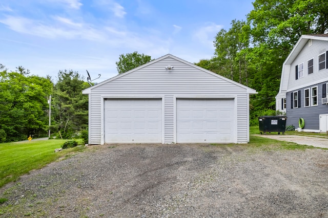 garage with a yard