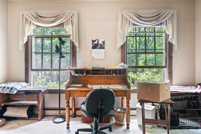 office area featuring a baseboard heating unit