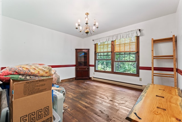 bedroom with a notable chandelier, baseboard heating, and dark hardwood / wood-style flooring