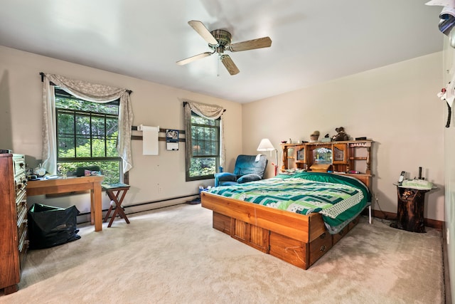 carpeted bedroom with multiple windows and ceiling fan