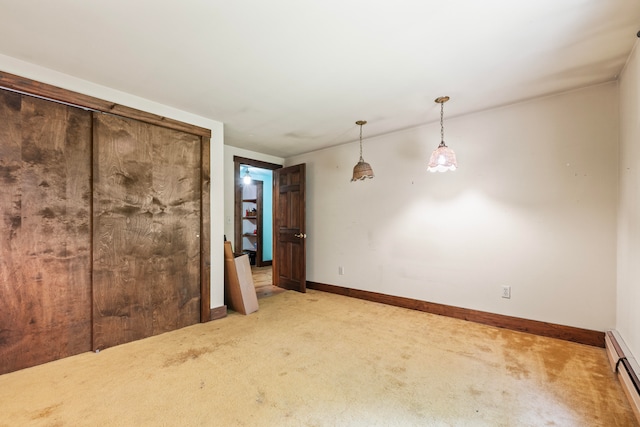 interior space featuring a baseboard heating unit