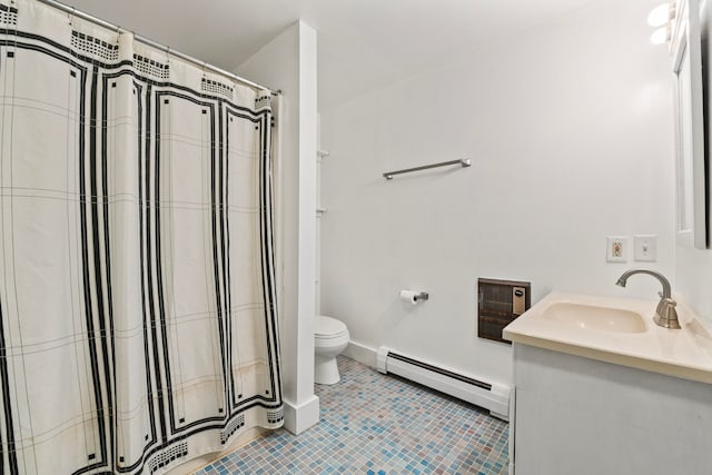 bathroom featuring vanity, toilet, heating unit, a baseboard heating unit, and tile patterned flooring