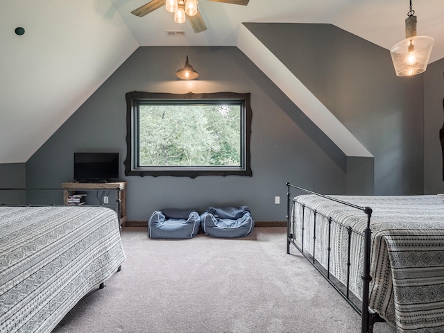 bedroom with lofted ceiling, carpet flooring, and ceiling fan