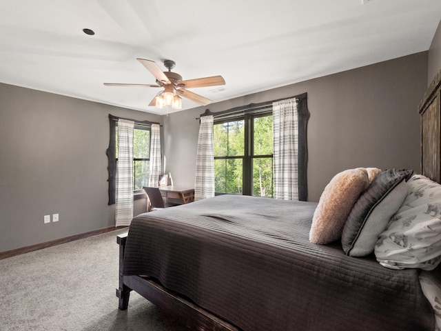 bedroom featuring ceiling fan and carpet flooring