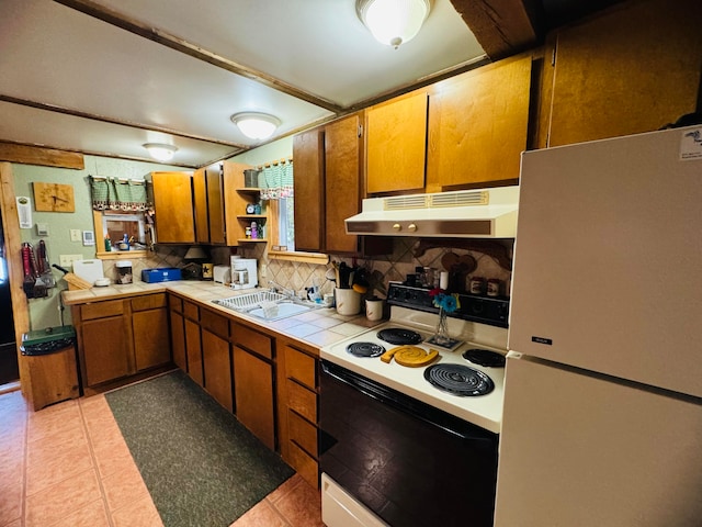 kitchen featuring white appliances, sink, tile counters, backsplash, and light tile patterned floors