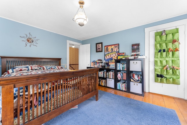 bedroom featuring wood-type flooring