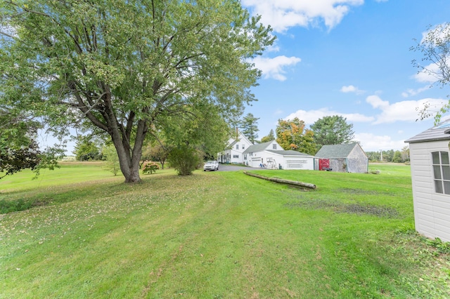 view of yard with a garage