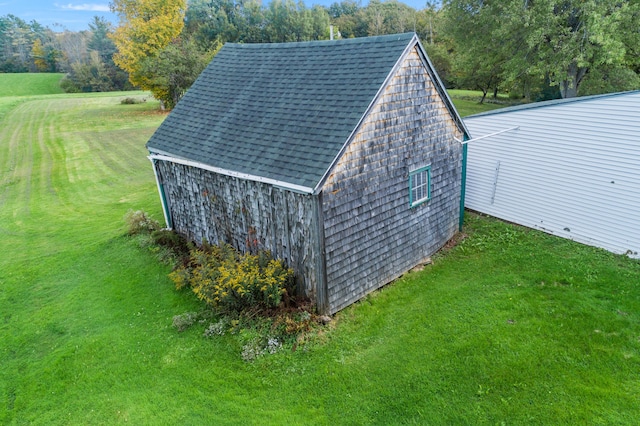 view of outdoor structure featuring a yard