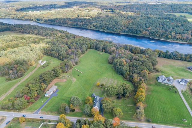 birds eye view of property with a rural view and a water view