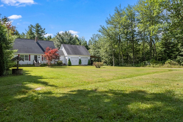 view of yard featuring a garage