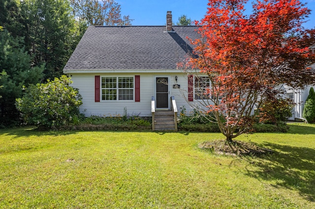 view of front of home with a front yard