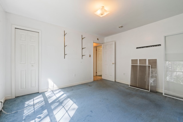 unfurnished bedroom featuring carpet flooring