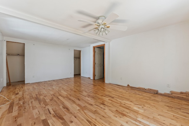 unfurnished bedroom featuring light hardwood / wood-style flooring and ceiling fan