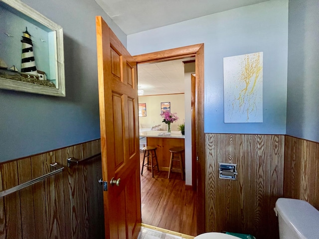 interior space featuring toilet and hardwood / wood-style floors