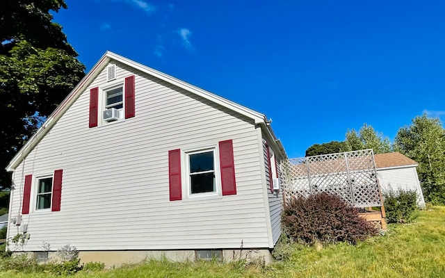 view of property exterior with cooling unit