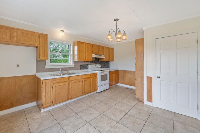 kitchen featuring hanging light fixtures, wood walls, white range with electric cooktop, a chandelier, and sink