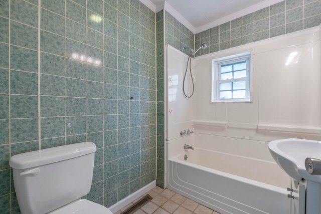 bathroom featuring shower / bathing tub combination, tile walls, crown molding, and toilet